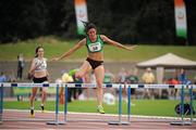 28 July 2013; Jessie Barr, Ferrybank A.C., Co. Waterford, on her way to winning the Women's 400m hurdles event at the Woodie’s DIY National Senior Track and Field Championships. Morton Stadium, Santry, Co. Dublin. Picture credit: Tomas Greally / SPORTSFILE