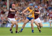 28 July 2013; Conor Ryan, Clare, in action against Jonathan Glynn, left, and James Regan, Galway. GAA Hurling All-Ireland Senior Championship, Quarter-Final, Galway v Clare, Semple Stadium, Thurles, Co. Tipperary. Picture credit: Stephen McCarthy / SPORTSFILE