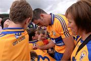 28 July 2013; Clare's Brendan Bugler signs jerseys for supporters after the game. GAA Hurling All-Ireland Senior Championship, Quarter-Final, Galway v Clare, Semple Stadium, Thurles, Co. Tipperary. Picture credit: Ray McManus / SPORTSFILE
