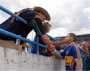 28 July 2013; Clare goalkeeper Patrick Kelly is congratulated by supporters after the game. GAA Hurling All-Ireland Senior Championship, Quarter-Final, Galway v Clare, Semple Stadium, Thurles, Co. Tipperary. Picture credit: Ray McManus / SPORTSFILE