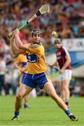 28 July 2013; Colin Ryan strikes a free for Clare. GAA Hurling All-Ireland Senior Championship, Quarter-Final, Galway v Clare, Semple Stadium, Thurles, Co. Tipperary. Picture credit: Ray McManus / SPORTSFILE