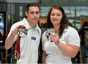 28 July 2013; The Irish squad, sponsored by Allianz, return from the 2013 IPC Athletics World Championships in Lyon, France, having secured a total of four gold medals and one silver medal. Pictured is Jason Smyth, left, Eglinton, Co. Derry, gold medals in the Men’s 100m – T13 and Men’s 200m – T13, and Orla Barry, Ladysbridge, Co. Cork, silver medal, Women’s Discus Throw – F57/58. Dublin Airport, Dublin. Picture credit: Matt Browne / SPORTSFILE