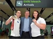 28 July 2013; The Irish squad, sponsored by Allianz, return from the 2013 IPC Athletics World Championships in Lyon, France, having secured a total of four gold medals and one silver medal. Pictured is Jason Smyth, left, Eglinton, Co. Derry, gold medals in the Men’s 100m – T13 and Men’s 200m – T13, Orla Barry, Ladysbridge, Co. Cork, silver medal, Women’s Discus Throw – F57/58, and Damien O'Neill, centre, Allianz Ireland. Dublin Airport, Dublin. Picture credit: Matt Browne / SPORTSFILE