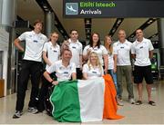 28 July 2013; The Irish squad, sponsored by Allianz, return from the 2013 IPC Athletics World Championships in Lyon, France, having secured a total of four gold medals and one silver medal. Pictured are members of the Irish squad with medal winners Jason Smyth, back row, third from left, Eglinton, Co. Derry, gold medals in the Men’s 100m – T13 and Men’s 200m – T13, and Orla Barry, back row, centre, Ladysbridge, Co. Cork, silver medal, Women’s Discus Throw – F57/58. Dublin Airport, Dublin. Picture credit: Matt Browne / SPORTSFILE