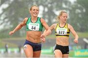 28 July 2013; Kelly Proper, left, Ferrybank A.C., Co. Waterford, celebrates as she crosses the line to win the Women's 100m event ahead of second place Ailis McSweeney, Leevale AC, Co. Cork, right, at the Woodie’s DIY National Senior Track and Field Championships. Morton Stadium, Santry, Co. Dublin. Picture credit: Tomas Greally / SPORTSFILE