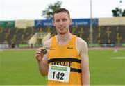 27 July 2013; Winer of the Men's Triple Jump Denis Finnegan, from Leevale A.C., Co. Cork, celebrates with his gold medal at the Woodie’s DIY National Senior Track and Field Championships. Morton Stadium, Santry, Co. Dublin. Picture credit: Matt Browne / SPORTSFILE