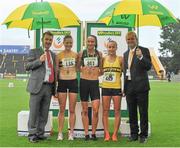 28 July 2013; Professor Ciarán Ó Catháin, President of Athletics Ireland, left, and Peter Dolan, Executive Marketing Manager, Woodie's DIY and Garden Centres, right, with Winner of the Women's 1500m event Laura Crowe, An Riocht A.C., Co. Kerry, centre, second place Claire McSweeney, Leevale A.C., Co. Cork, left, and third place Michelle Finn, Leevale A.C., Co. Cork, at the Woodie’s DIY National Senior Track and Field Championships. Morton Stadium, Santry, Co. Dublin. Picture credit: Tomas Greally / SPORTSFILE