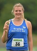 27 July 2013; Winner of the Women's Discus Clare Fitzgerald, Tralee Harriers A.C., Co. Kerry, celebrates with her gold medal at the Woodie’s DIY National Senior Track and Field Championships. Morton Stadium, Santry, Co. Dublin. Picture credit: Matt Browne / SPORTSFILE
