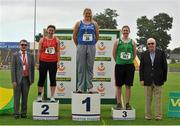 28 July 2013; Professor Ciarán Ó Catháin, President of Athletics Ireland, left, and Ray Colman, Chief Executive of Woodie's DIY and Garden Centres, right, with winner of the Women's Shot Put event Clare Fitzgerald, Tralee Harriers A.C., Co. Kerry, second place Fiona Moloney, Dooneen A.C., Co. Limerick, left, and third place Niamh Murphy, Blarney/Inniscara A.C., Co. Cork, at the Woodie’s DIY National Senior Track and Field Championships. Morton Stadium, Santry, Co.Dublin. Picture credit: Tomas Greally / SPORTSFILE
