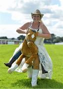 29 July 2013; Corinna Maguire, from Oranmore, Co. Galway, after the bridal race, in aid of Special Olympics. Galway Racing Festival, Ballybrit, Co. Galway. Picture credit: Barry Cregg / SPORTSFILE