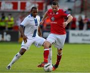 29 July 2013; Dean Kelly, Shelbourne, in action against Rudolph Austin, Leeds United XI. Friendly, Shelbourne v Leeds United XI, Tolka Park, Dublin. Picture credit: David Maher / SPORTSFILE