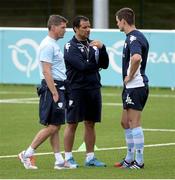 30 July 2013; Racing Metro's Jonathan Sexton, right, and kicking coach Ronan O'Gara in conversation with head coach Laurent Labit during squad training. Racing Metro Squad Training, Avenue Paul Langevin, Le Plessis Robinson, Paris, France. Picture credit: Fred Porcu / SPORTSFILE