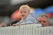 30 July 2013; Eighteen month old Ciaran Moran, from Craughwell, Co. Galway, watches the Latin Quarter Steeplechase. Galway Racing Festival, Ballybrit, Co. Galway. Picture credit: Barry Cregg / SPORTSFILE