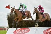 30 July 2013; Hidden Cyclone, with Andrew McNamara up, who finished second, leads eventual winner Rathlin, with Davy Russell up, in the Latin Quarter Steeplechase. Galway Racing Festival, Ballybrit, Co. Galway. Picture credit: Barry Cregg / SPORTSFILE