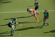 30 July 2013; Maxime Kerstholt, Netherlands, shoots to score her side's sixth goal despite the attempts of, from left, Hannah Grieve, Amber Gleeson, and Millie O'Donnell, Ireland. Electric Ireland EuroHockey U18 Girls Championships, Group A, Ireland v Netherlands, National Hockey Stadium, Belfield, Dublin. Picture credit: Brian Lawless / SPORTSFILE