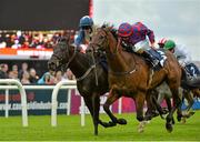 30 July 2013; Silver Slew, left, with Gary Carroll up, races ahead of Tax Reform, with Chris Hayes up, who finished second, on their way to winning the Caulfieldindustrial.com European Breeders Fund Maiden. Galway Racing Festival, Ballybrit, Co. Galway. Picture credit: Barry Cregg / SPORTSFILE