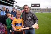 31 July 2013; Etihad Airways, sponsors of the GAA Hurling All Ireland Senior Championship, has launched &quot;Raise The Bar&quot; 2013; where GAA clubs can win the ultimate prize, a year's sponsorship package with the Abu Dhabi based airline. At the launch is Clare manager Davy Fitzgerald with nine year old Clare supporter Evan Maxted, from Quin. Croke Park, Dublin. Picture credit: Ray McManus / SPORTSFILE