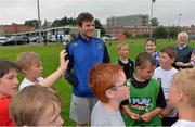 31 July 2013; Leinster's Gordon D'Arcy with camp participants during a Leinster Rugby Summer Camp at Donnybrook, Dublin. Picture credit: Brian Lawless / SPORTSFILE