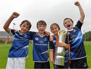 31 July 2013; Camp participants and Leinster supporters, from left, Harry Kennedy, age 9, from Sandymount, Daragh Lawlor, age 10, from Sandymount, Sam McGannon, age 9, from Dun Laoghaire, and David Fegan, age 10, from Ballsbridge, with Celtic League trophy, during a Leinster Rugby Summer Camp at Donnybrook, Dublin. Picture credit: Brian Lawless / SPORTSFILE