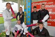 31 July 2013; Jockeys, from left, Robbie Power, David Casey, Jane Mangan, Davy Condon, Shane Foley and Mark Walsh join together in a test of strength in aid of the Jockeys Emergency Fund. Galway Racing Festival, Ballybrit, Co. Galway. Picture credit: Barry Cregg / SPORTSFILE