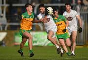 6 February 2022; Mick O'Grady of Kildare in action against Michael Langan of Donegal during the Allianz Football League Division 1 match between Donegal and Kildare at MacCumhaill Park in Ballybofey, Donegal. Photo by Oliver McVeigh/Sportsfile