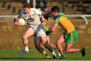 6 February 2022; Daniel Flynn of Kildare in action against Brendan McCole of Donegal during the Allianz Football League Division 1 match between Donegal and Kildare at MacCumhaill Park in Ballybofey, Donegal. Photo by Oliver McVeigh/Sportsfile