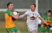 6 February 2022; Jason McGee of Donegal in action against Paul Cribbin of Kildare during the Allianz Football League Division 1 match between Donegal and Kildare at MacCumhaill Park in Ballybofey, Donegal. Photo by Oliver McVeigh/Sportsfile