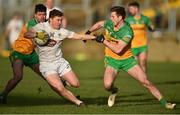 6 February 2022; Jimmy Hyland of Kildare in action against Brendan McCole and Eoghan Gallagher of Donegal during the Allianz Football League Division 1 match between Donegal and Kildare at MacCumhaill Park in Ballybofey, Donegal. Photo by Oliver McVeigh/Sportsfile