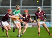 6 February 2022; Adrian Cleary of Offaly in action against, from left, Ronan Glennon, Tom Monaghan, and Gearoid McInerney of Galway during the Allianz Hurling League Division 1 Group A match between Galway and Offaly at Pearse Stadium in Galway. Photo by Ray Ryan/Sportsfile