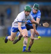 6 February 2022; Tom Barron of Waterford in action against James Madden of Dublin during the Allianz Hurling League Division 1 Group B match between Dublin and Waterford at Parnell Park in Dublin. Photo by Stephen McCarthy/Sportsfile
