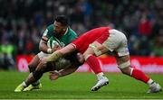 5 February 2022; Bundee Aki of Ireland is tackled by Taine Basham of Wales during the Guinness Six Nations Rugby Championship match between Ireland and Wales at Aviva Stadium in Dublin. Photo by Brendan Moran/Sportsfile