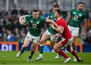 5 February 2022; Andrew Conway of Ireland is tackled by Dan Biggar of Wales during the Guinness Six Nations Rugby Championship match between Ireland and Wales at Aviva Stadium in Dublin. Photo by Brendan Moran/Sportsfile