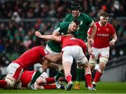 5 February 2022; Jonathan Sexton of Ireland is tackled by Ryan Elias of Wales during the Guinness Six Nations Rugby Championship match between Ireland and Wales at the Aviva Stadium in Dublin. Photo by David Fitzgerald/Sportsfile
