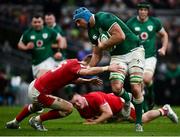 5 February 2022; Tadhg Beirne of Ireland is tackled by Liam Williams of Wales during the Guinness Six Nations Rugby Championship match between Ireland and Wales at the Aviva Stadium in Dublin. Photo by David Fitzgerald/Sportsfile