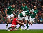 5 February 2022; Mack Hansen of Ireland supported by team mates, from left, Hugo Keenan, Jonathan Sexton and Jamison Gibson Park is tackled by Nick Tompkins of Wales during the Guinness Six Nations Rugby Championship match between Ireland and Wales at the Aviva Stadium in Dublin. Photo by David Fitzgerald/Sportsfile