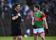 6 February 2022; Referee Sean Hurson speaks with Lee Keegan of Mayo during the Allianz Football League Division 1 match between Monaghan and Mayo at St Tiernach's Park in Clones, Monaghan. Photo by David Fitzgerald/Sportsfile