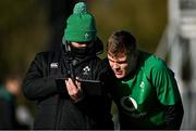 9 February 2022; Garry Ringrose, right, looks at a video review during the Ireland rugby squad training at Carton House in Maynooth, Kildare. Photo by Brendan Moran/Sportsfile
