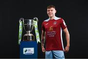 9 February 2022; Beineon Whitmarsh O’Brien of Cobh Ramblers with the SSE Airtricity League First Division trophy at the launch of the SSE Airtricity Premier & First Division and Women's National League 2022 season held at HBV Studios in Clarehall, Dublin. Photo by Harry Murphy/Sportsfile