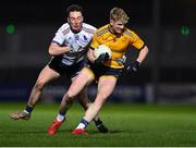 10 February 2022; Red Óg Murphy of DCU Dóchas Éireann in action against Ciarán Downes of UL during the Electric Ireland HE GAA Sigerson Cup Semi-Final match between DCU Dóchas Éireann and University of Limerick at Dr Cullen Park in Carlow. Photo by Piaras Ó Mídheach/Sportsfile