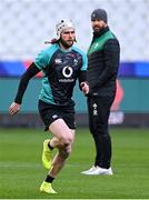 11 February 2022; Mack Hansen, watched by head coach Andy Farrell, during the Ireland captain's run at Stade de France in Paris, France. Photo by Brendan Moran/Sportsfile