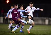 11 February 2022; Dan Williams of Dundalk in action against Dylan Grimes of Drogheda United during the Jim Malone Cup match between Dundalk and Drogheda United at Oriel Park in Dundalk, Louth. Photo by Ben McShane/Sportsfile