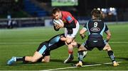 11 February 2022; Rory Scannell of Munster is tackled by Duncan Weir of Glasgow during the United Rugby Championship match between Glasgow Warriors and Munster at Scotstoun Stadium in Glasgow, Scotland. Photo by Paul Devlin/Sportsfile