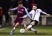 11 February 2022; Darragh Markey of Drogheda United is tackled by Dan Williams of Dundalk during the Jim Malone Cup match between Dundalk and Drogheda United at Oriel Park in Dundalk, Louth. Photo by Ben McShane/Sportsfile