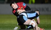 11 February 2022; Chris Farrell of Munster is tackled by Robbie Fergusson of Glasgow during the United Rugby Championship match between Glasgow Warriors and Munster at Scotstoun Stadium in Glasgow, Scotland. Photo by Paul Devlin/Sportsfile