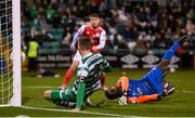11 February 2022; Ronan Finn of Shamrock Rovers scores his side's first goal past St Patrick's Athletic goalkeeper Joseph Anang during the FAI President's Cup match between Shamrock Rovers and St Patrick's Athletic at Tallaght Stadium in Dublin. Photo by Stephen McCarthy/Sportsfile