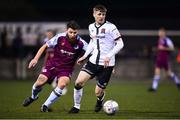 11 February 2022; Mark Hanratty of Dundalk in action against Gary Deegan of Drogheda United during the Jim Malone Cup match between Dundalk and Drogheda United at Oriel Park in Dundalk, Louth. Photo by Ben McShane/Sportsfile
