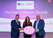 11 February 2022; Eva Scanlon from Tir Chonaill Gaels, London, is presented with the International Volunteer of the Year award by Ladies Gaelic Football Association President Mícheál Naughton and Mr Seamus Newcombe, chief executive officer of currentaccount.ie, right, during the 2021 LGFA National Volunteer of the Year awards, in association with currentaccount.ie, at Croke Park in Dublin. Photo by Piaras Ó Mídheach/Sportsfile