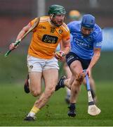 12 February 2022; Niall McKenna of Antrim in action against John Bellew of Dublin during the Allianz Hurling League Division 1 Group B match between Antrim and Dublin at Corrigan Park in Belfast. Photo by Ben McShane/Sportsfile