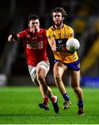 5 February 2022; Manus Doherty of Clare and Mark Cronin of Cork during the Allianz Football League Division 2 match between Cork and Clare at Páirc Ui Chaoimh in Cork. Photo by Ben McShane/Sportsfile