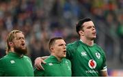 12 February 2022; Ireland captain James Ryan, right, with Andrew Conway, centre, and Andrew Porter during the nation anthem before the Guinness Six Nations Rugby Championship match between France and Ireland at Stade de France in Paris, France. Photo by Seb Daly/Sportsfile